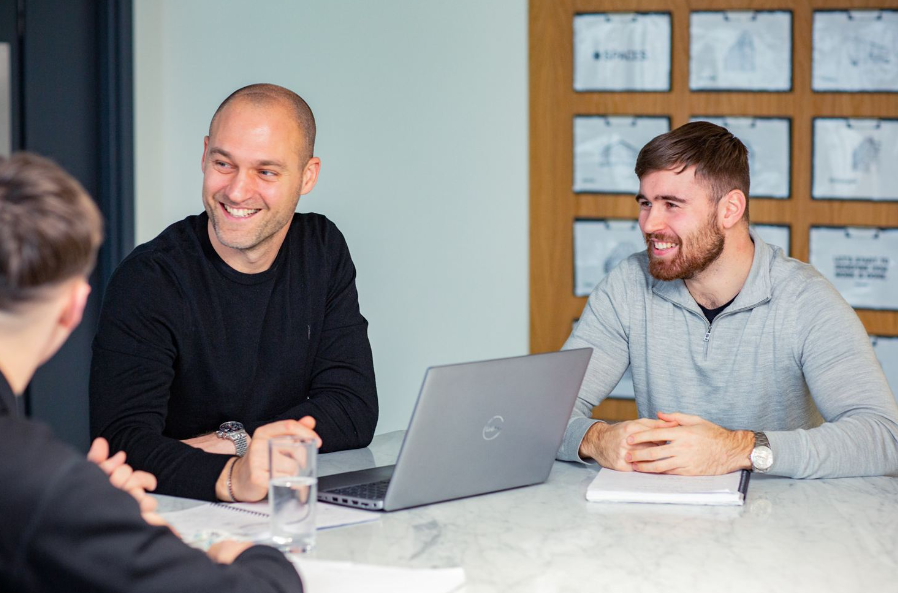 tech recruiter team smiling