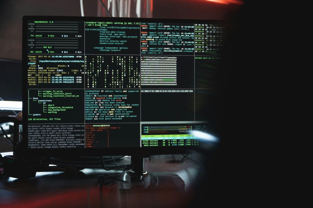coding on a large desktop monitor